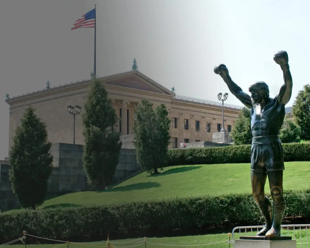 Rocky statue in front of the Philadelphia Museum of Art with American flag