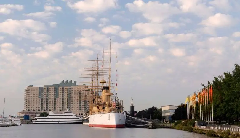 Historic ship docked at Penn’s Landing with Dockside Condominiums in the background, Philadelphia waterfront.