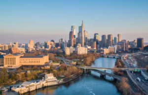 Philadelphia skyline along the Schuylkill River with Kelly Drive and Center City buildings