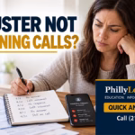 Woman reviewing unanswered call notes and claim paperwork after her insurance adjuster stopped returning calls, with the PhillyLegalConnect Quick Answer Series banner.